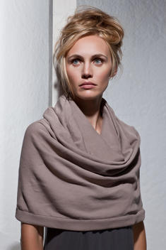 Portrait Of An Attractive Blonde Woman Wearing A Poncho, New York City, New York State, Usa.