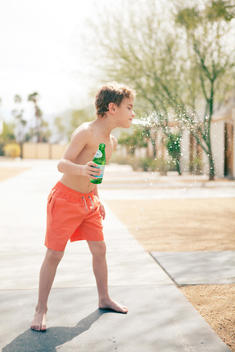 Palm Springs boy spitting water
