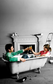 Couple In Claw Foot Bathtub Drinking Champagne, Toasting The Future.