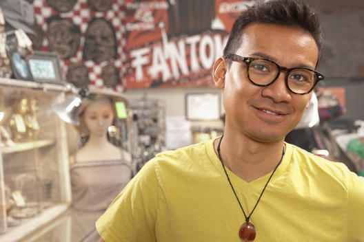 Malaysian man in vintage store