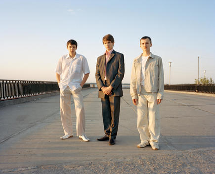 Russian Teenagers Dressed In Suits Pose At Dawn After Their Graduation Ball.