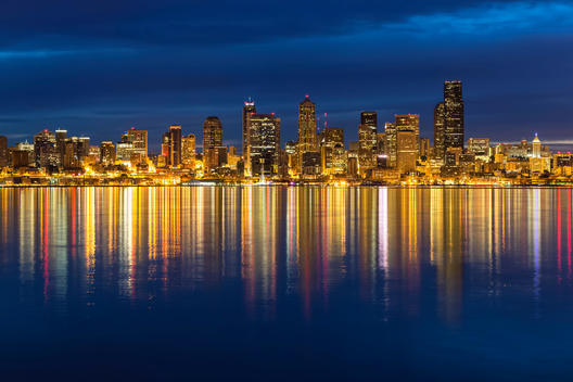 USA, Washington State, Puget Sound and skyline of Seattle at blue hour