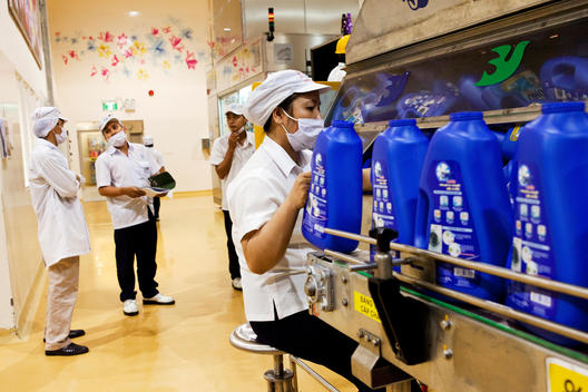 Supervisors keep an eye on production at the Unilever factory.