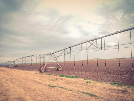 Agricultural field mobile irrigation pipe system, Texas, USA