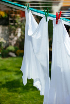 White laundry hanging outside