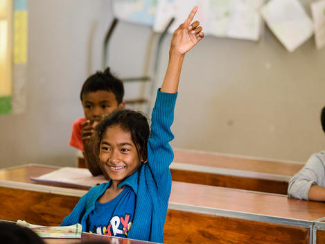 A girl in class at Who Will Village, an orphanage outside Phnom Penh, Cambodia.