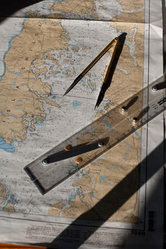 Compass And Ruler Over Map Of Coastal Chile