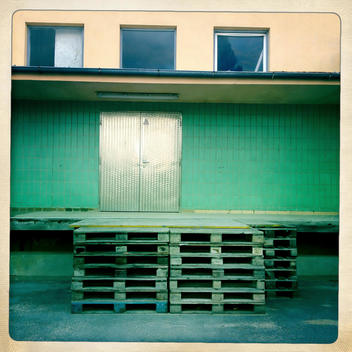Stacked pallets in front of warehouse, Horn, Lower Austria, Austria