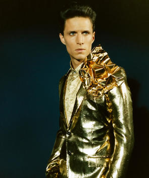 Portrait Of Man In Gold Suit