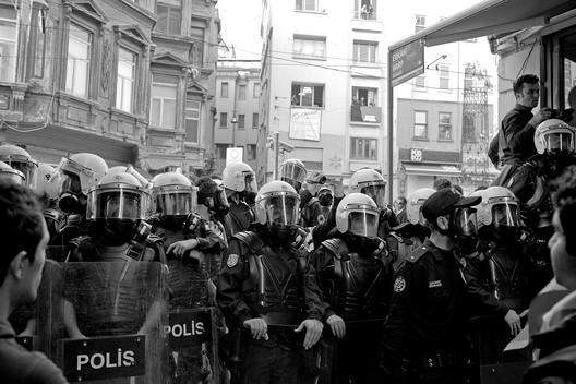 Police made up a barricade to not let go the protestors in one of the streets in Taksim,goverment banned on people of Turkey to March during a Republic day.