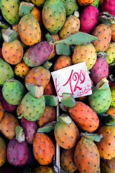 Close up of pile of prickly pear cactus fruit for sale