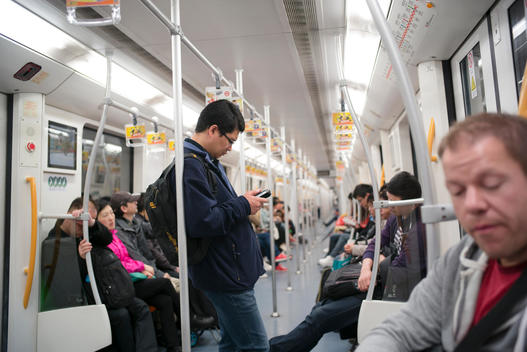Passengers ride the Shanghai Metro, the third rapid transit system in China.
