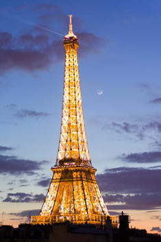 The Eiffel Tower At Night With Moon