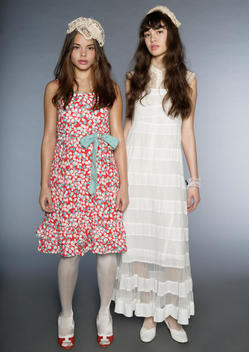Two young women in floral dresses. Tokyo inspired.