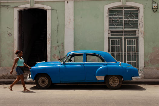 Vintage Blue Car In A Small Street Of Habana Vieja.