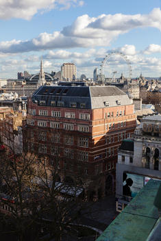 Leicester Square and Gardens. Rooftop View. London Eye and St Martin of the Fields on the Background.