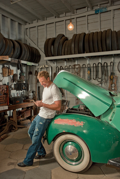 man hanging out in vintage garage