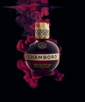 Chambord liqueur ink in water