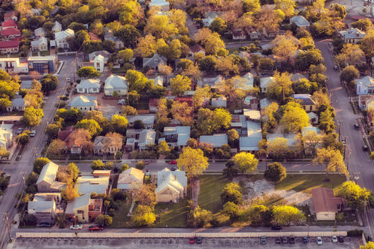 Aerial photo of neighborhood at dusk