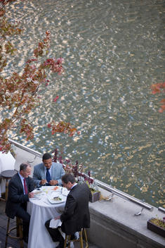 A Business Lunch At An Outdoor Patio Next To The Chicago River.