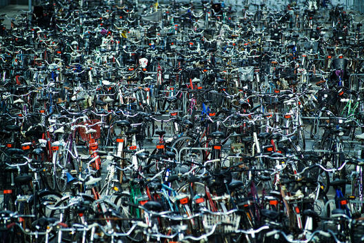 Large Amount Of Bicycles Parked Together