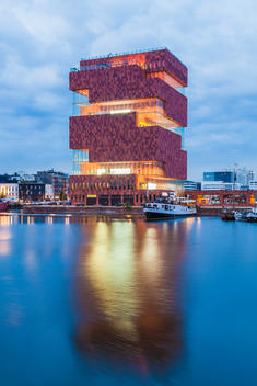 Belgium, Antwerp, Eilandje, view to Museum aan de Stroom at museum harbour at twilight
