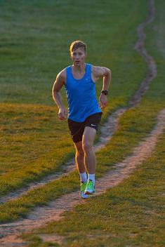 Runner running up hill