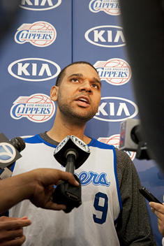Clippers player, Jared Dudley, gets interviewed by the press before a game