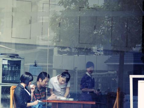 People Inside Cafe In Guiyang, China.