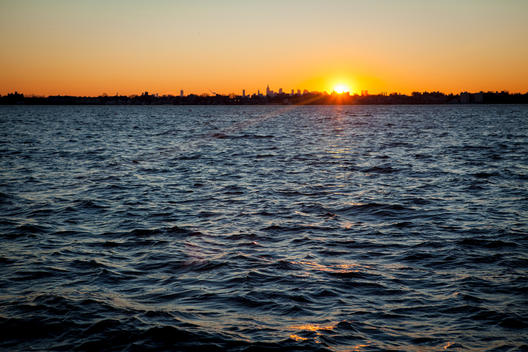 Sunset on the New York City skyline, from City Island, New York, USA