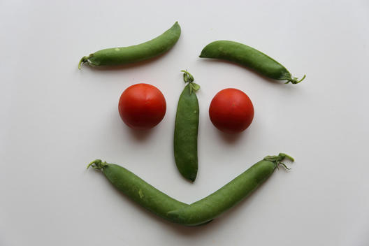 Smiling face realized with vegetables.