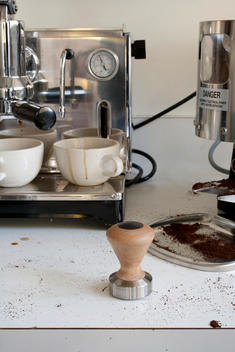 Coffee Press And Machine On Countertop