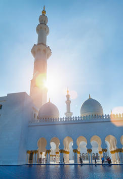 United Arab Emirates, Abu Dhabi, View of Sheikh Zayed Mosque against the sun