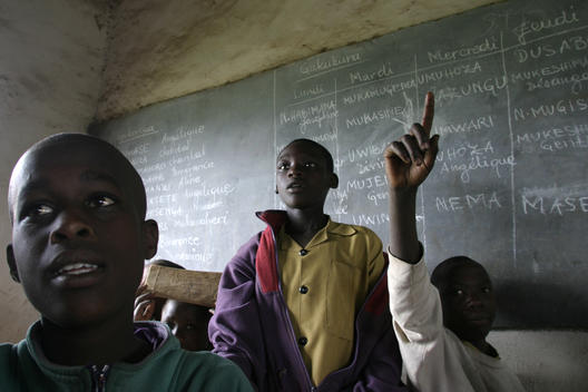 Young students at a school in Rwanda, East Africa. African children studying. African school. Attentive students. 10th anniversary of the Rwandan Genocide, April 2004. Part of their education includes 'civil liberties' classes where they learn about recon