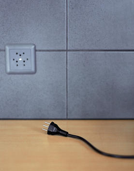 Plug and outlet in wall