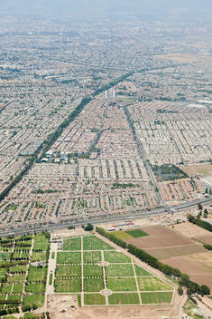 aerial view of rural fields and suburban development on outskirts of Santiago