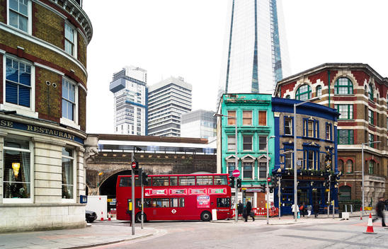 Street scene corner of Bermondsey Street and Tooley Street with The Shard in the background, London