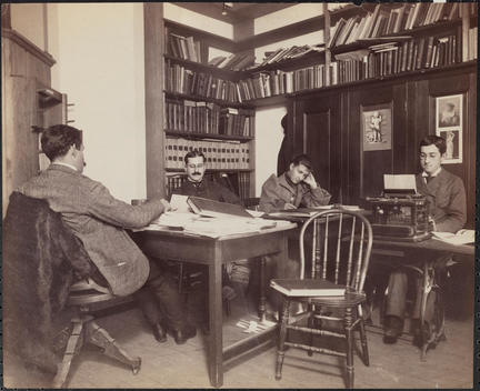 Office Of The Illustrated American Publishing Co. With Three Men And A Woman Working At Tables--One Man Typing.