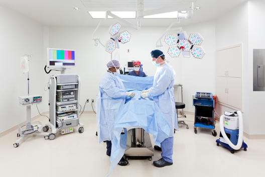 Operating room with medical equipment with nurses and doctor