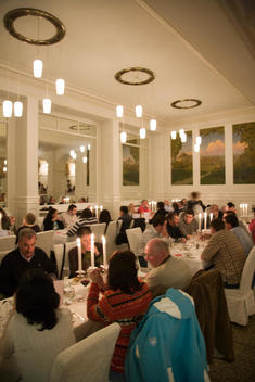 restaurant with people seated at tables at the Hotel Schatzalp