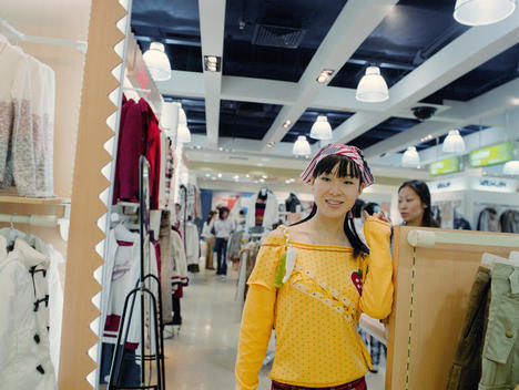 Chinese Girl Shopping Inside A Mall