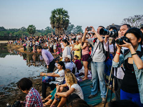 The crowd takes pictures of the sunrise at Angkor Wat, a Hindu, then a Buddhist, temple complex, in Siem Reap, Cambodia.