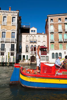 Colorful canal boat on the Grand Canal Venice, Italy.