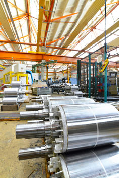 Electric motor production in a factory, shafts to be installed