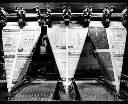 Folding of a newspaper printed on the rotary press at the printing center.
