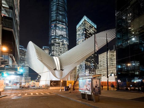 Transportation Hub in illuminated in the background designed by Santiago Calatrava. World Trade Center