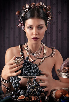 Baroque Image With Woman Pictured With Grapes.