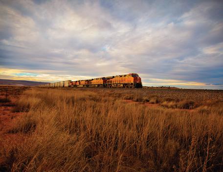 Orange Train crossing the desert in New Mexico