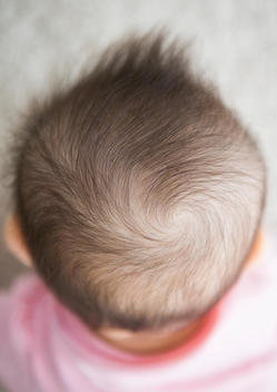 Close up of mixed race baby girl\'s hair