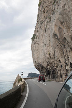 view of cliff-side road along Mediterranean sea